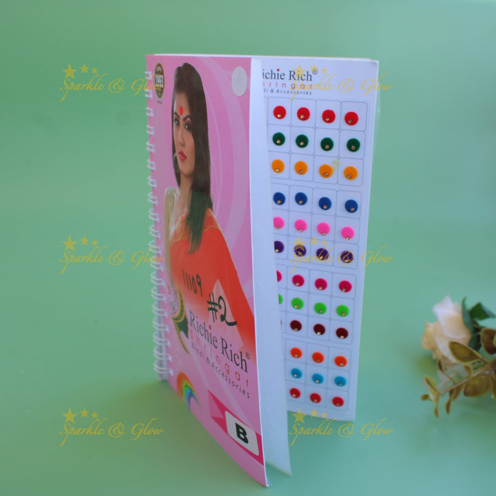 Richie Rich round single stone and 3D design bindi with different size in spiral book in assorted colours