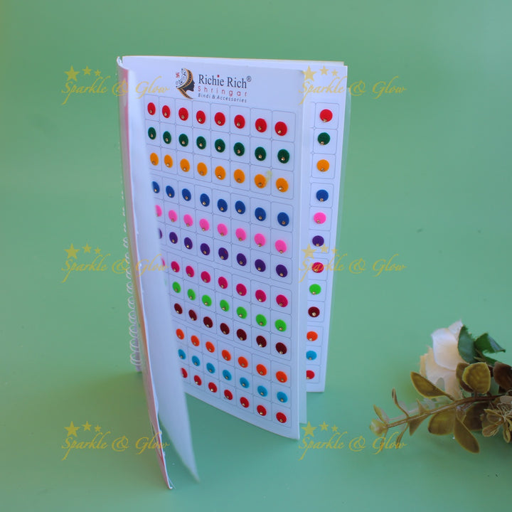 Richie Rich round single stone and 3D design bindi with different size in spiral book in assorted colours
