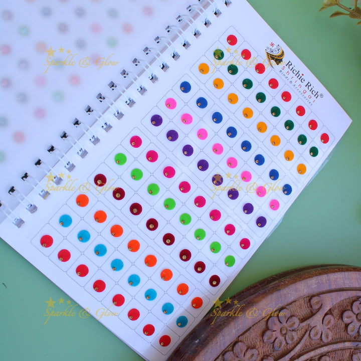 Richie Rich round single stone and 3D design bindi with different size in spiral book in assorted colours