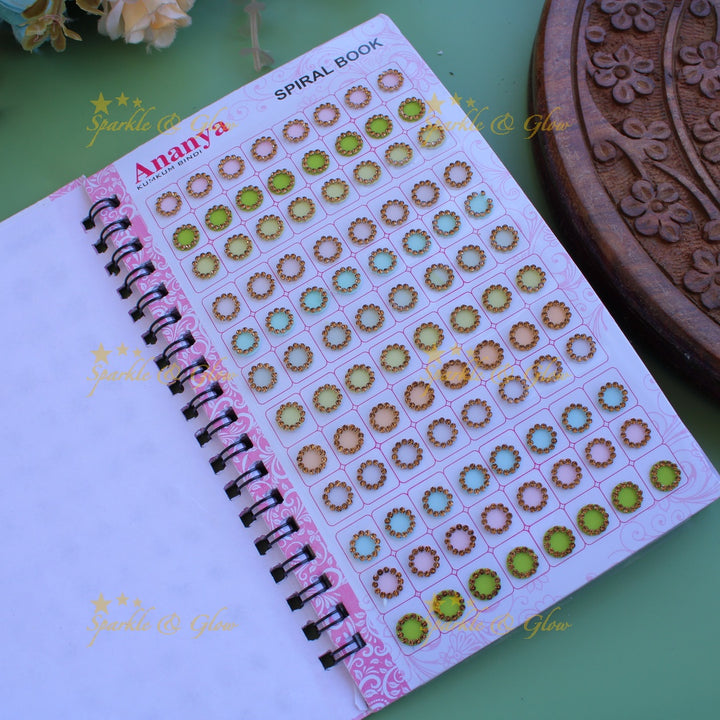 Ananya round stone bindi with different size in spiral book in pastel colours