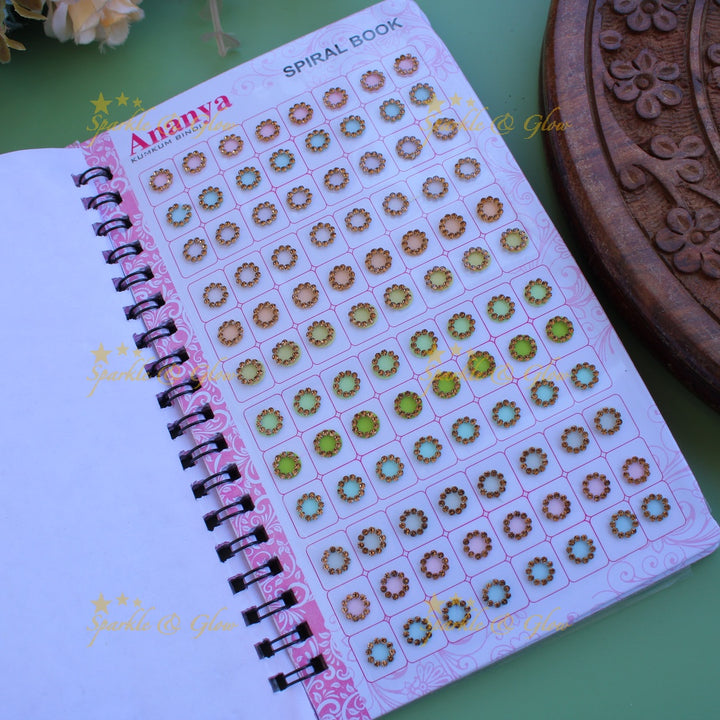 Ananya round stone bindi with different size in spiral book in pastel colours