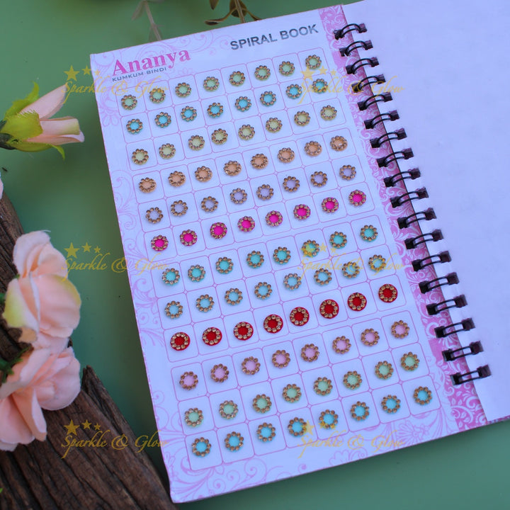 Ananya round stone bindi with different size in spiral book in pastel colours
