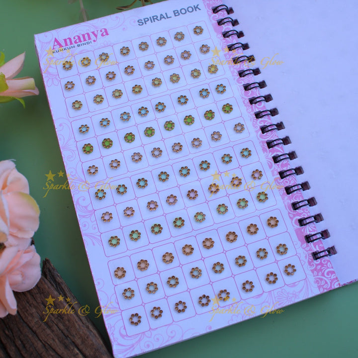 Ananya round stone bindi with different size in spiral book in pastel colours