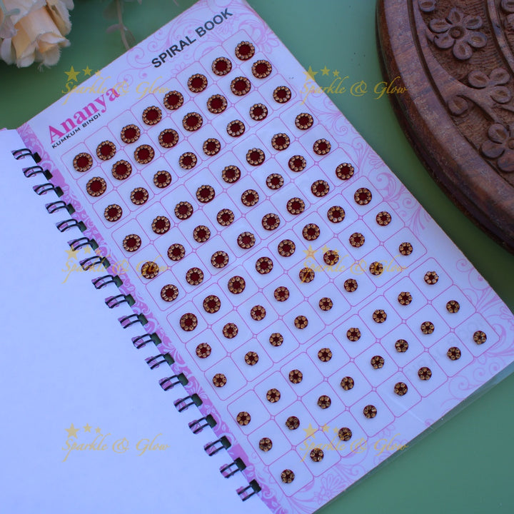 Ananya round stone bindi with different size in spiral book in pastel colours