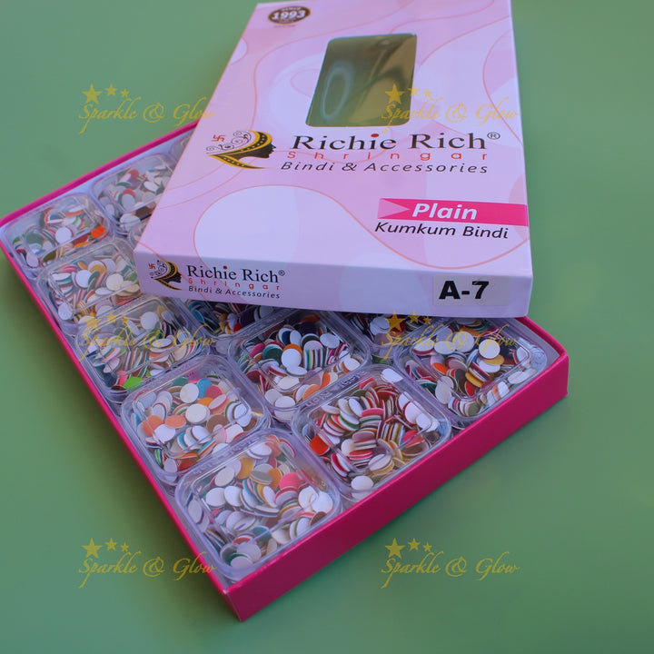 Richie Rich round plain bindi in box in assorted colours size - 7