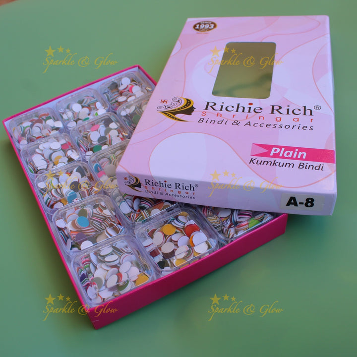 Richie Rich round plain bindi in box in assorted colours size - 8