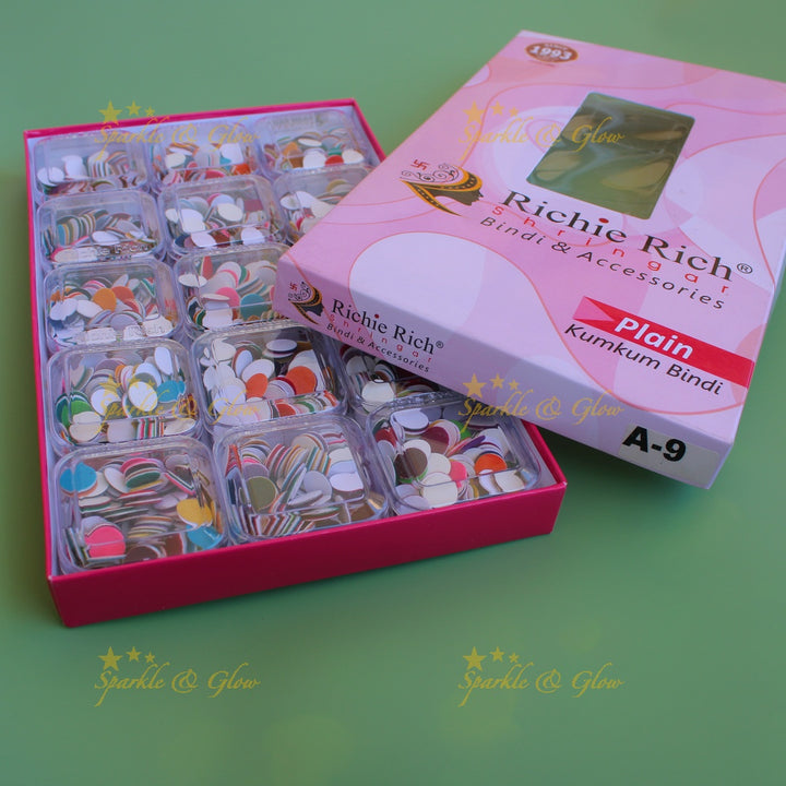 Richie Rich round plain bindi in box in assorted colours size - 9