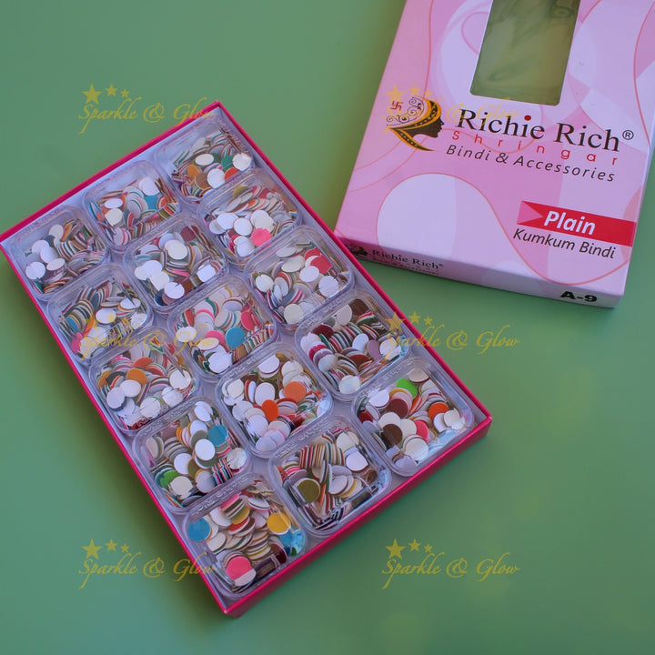 Richie Rich round plain bindi in box in assorted colours size - 9