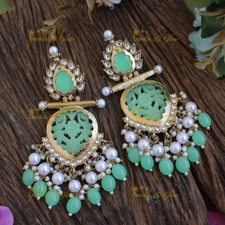 Bollywood inspired Statement flower carved leaf design balis with white colour stone pearls and beads