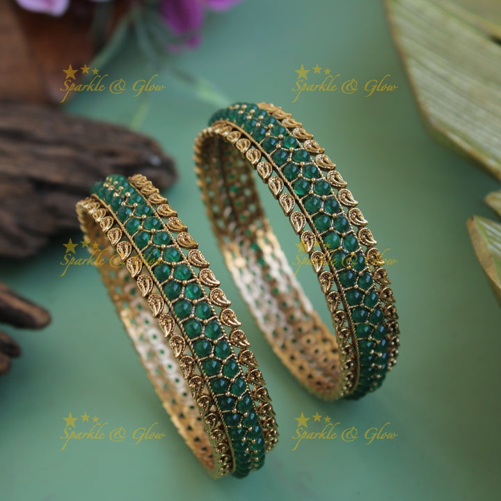 Elegant kemp stone leaf design bangles a pair