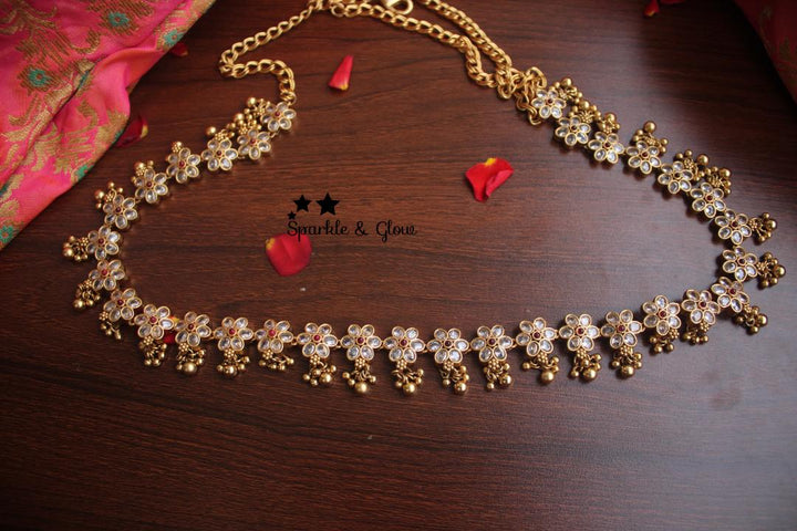 Flowe design Kemp stones hip chain with gold beads