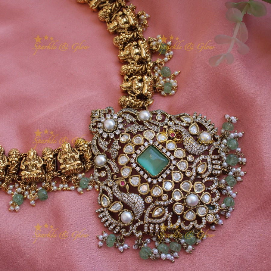 Grand intricate Lakshmi Peacock carved dual tone Victorian AD long necklace with mint green beads and stones - Sparkle and Glow - Back Thread - 