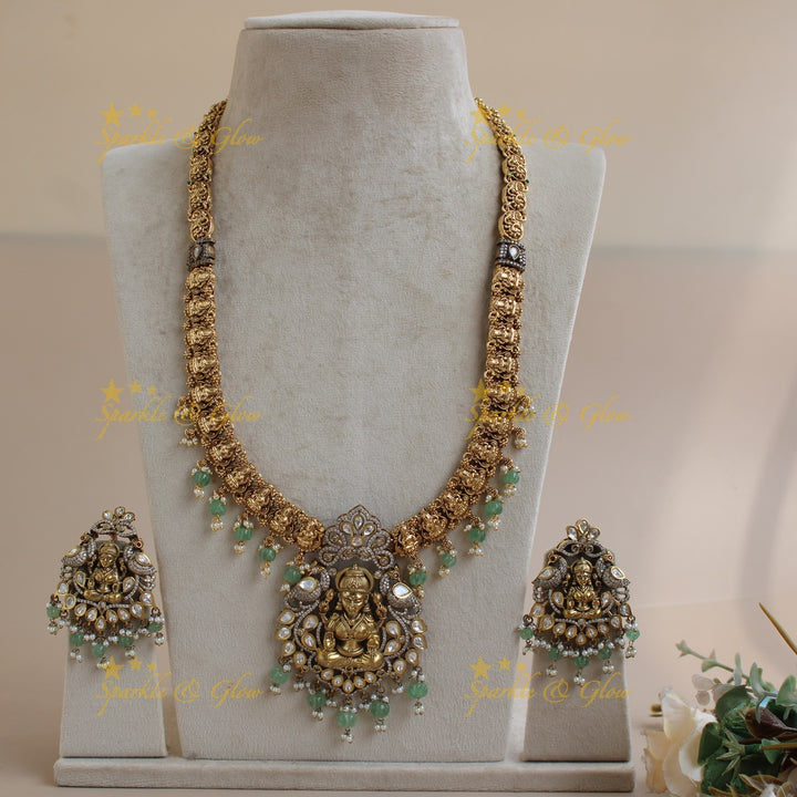 Exclusive Lakshmi Peacock flower carved dual tone Victorian AD long necklace with mint green beads