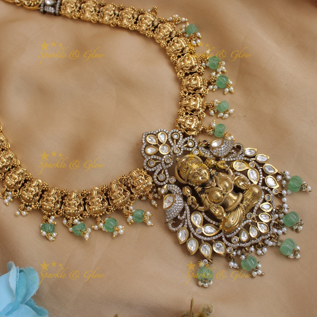 Exclusive Lakshmi Peacock flower carved dual tone Victorian AD long necklace with mint green beads