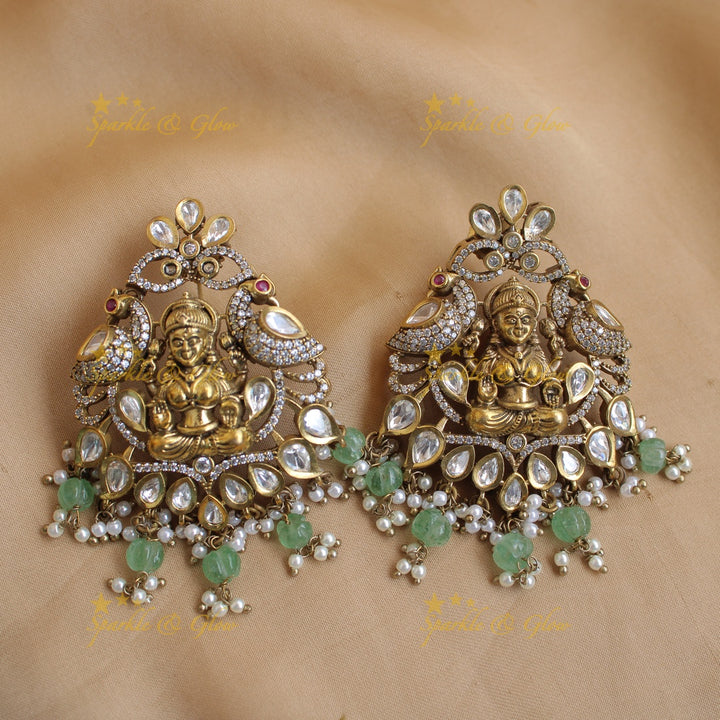 Exclusive Lakshmi Peacock flower carved dual tone Victorian AD long necklace with mint green beads