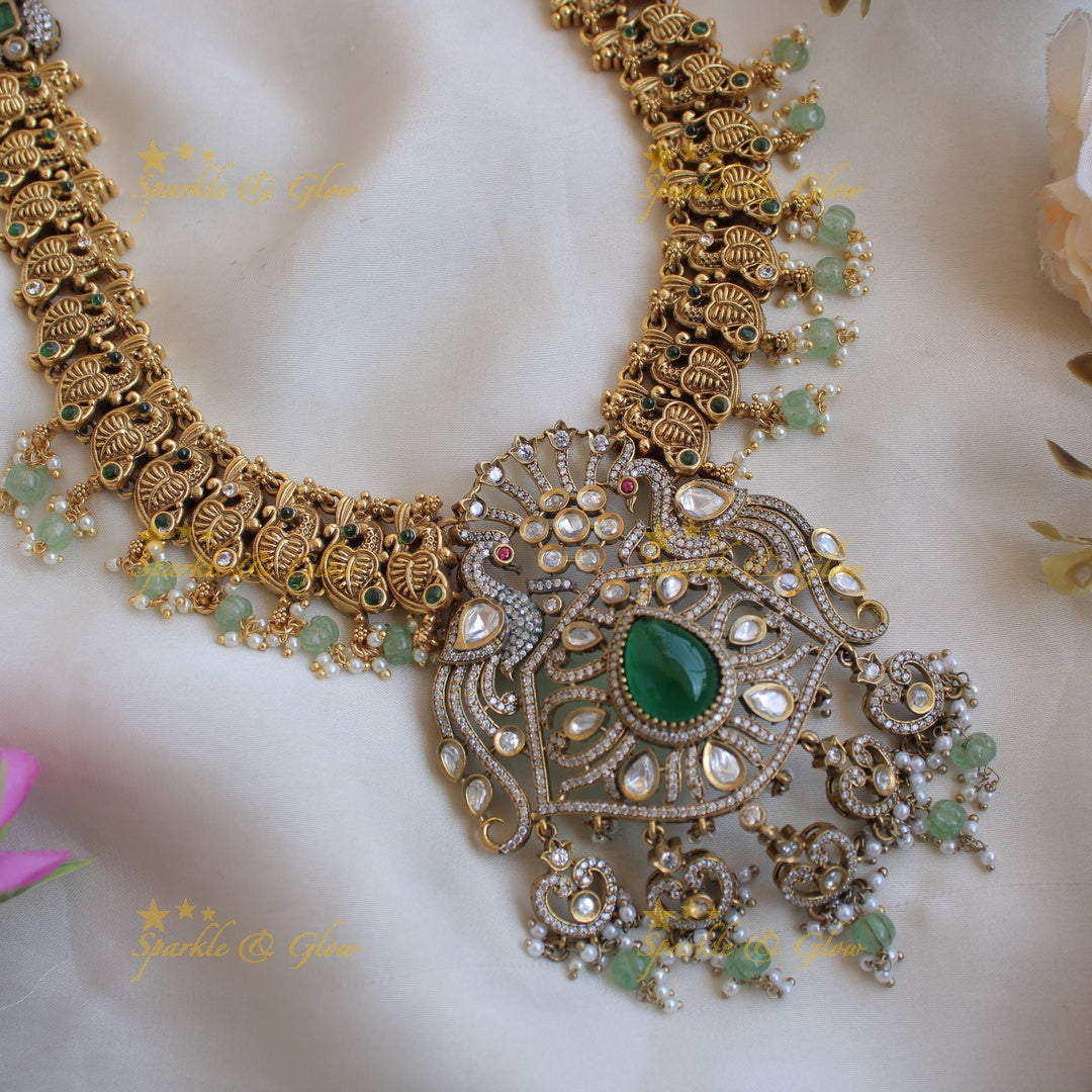 Statement Peacock design dual tone Victorian AD long necklace with emerald and mint green beads