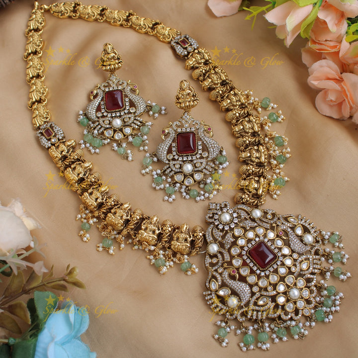 Grand intricate Lakshmi Peacock carved dual tone Victorian AD long necklace with mint green beads and red stones