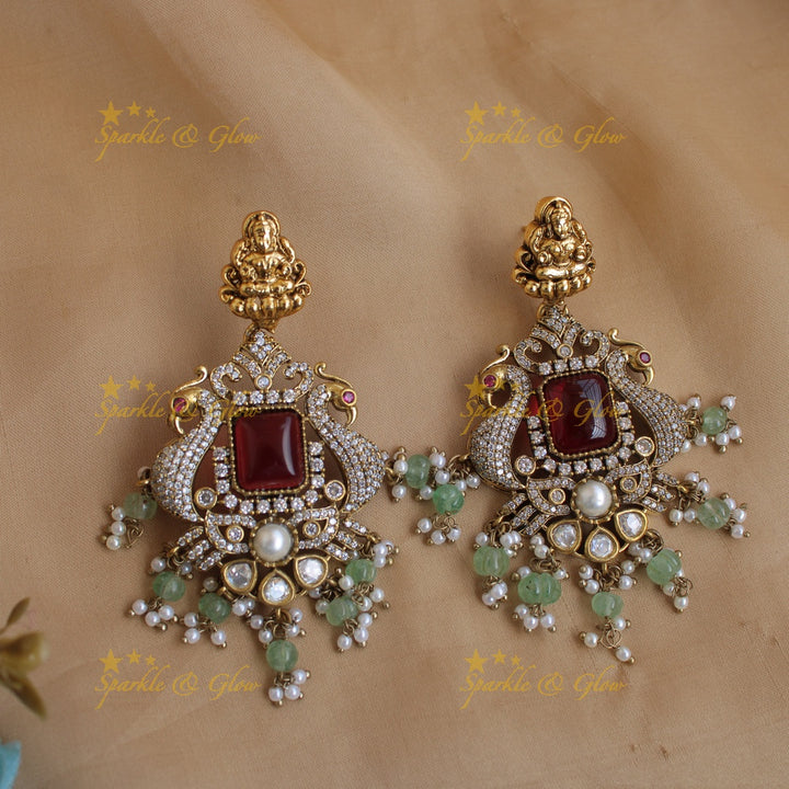 Grand intricate Lakshmi Peacock carved dual tone Victorian AD long necklace with mint green beads and red stones