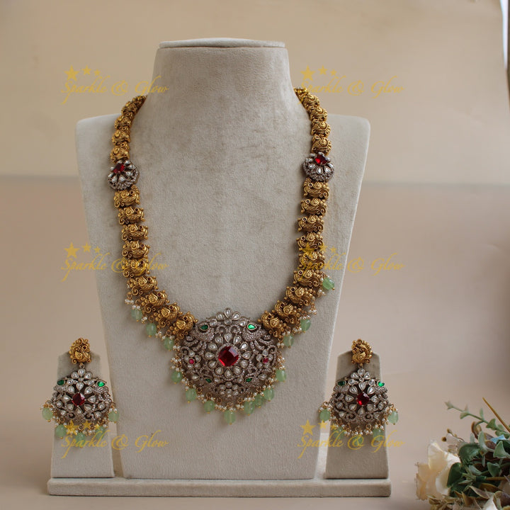 Exclusive Peacock floral design dual tone Victorian AD long necklace with mint green beads and red stones