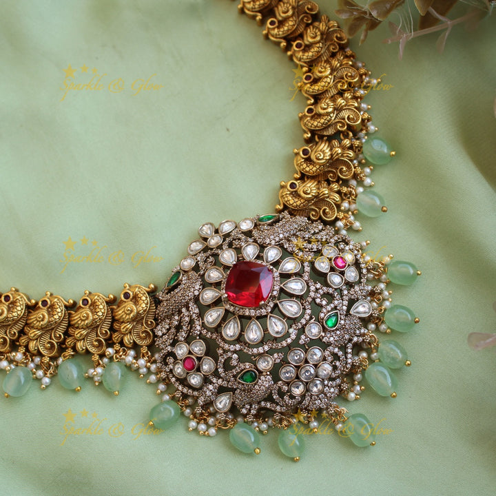 Exclusive Peacock floral design dual tone Victorian AD long necklace with mint green beads and red stones
