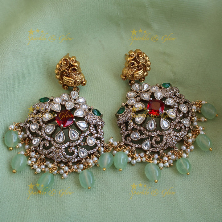 Exclusive Peacock floral design dual tone Victorian AD long necklace with mint green beads and red stones