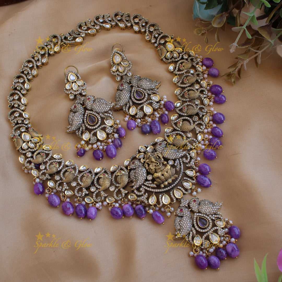 Grand intricate Ganesha parrot design Victorian AD long necklace with purple beads
