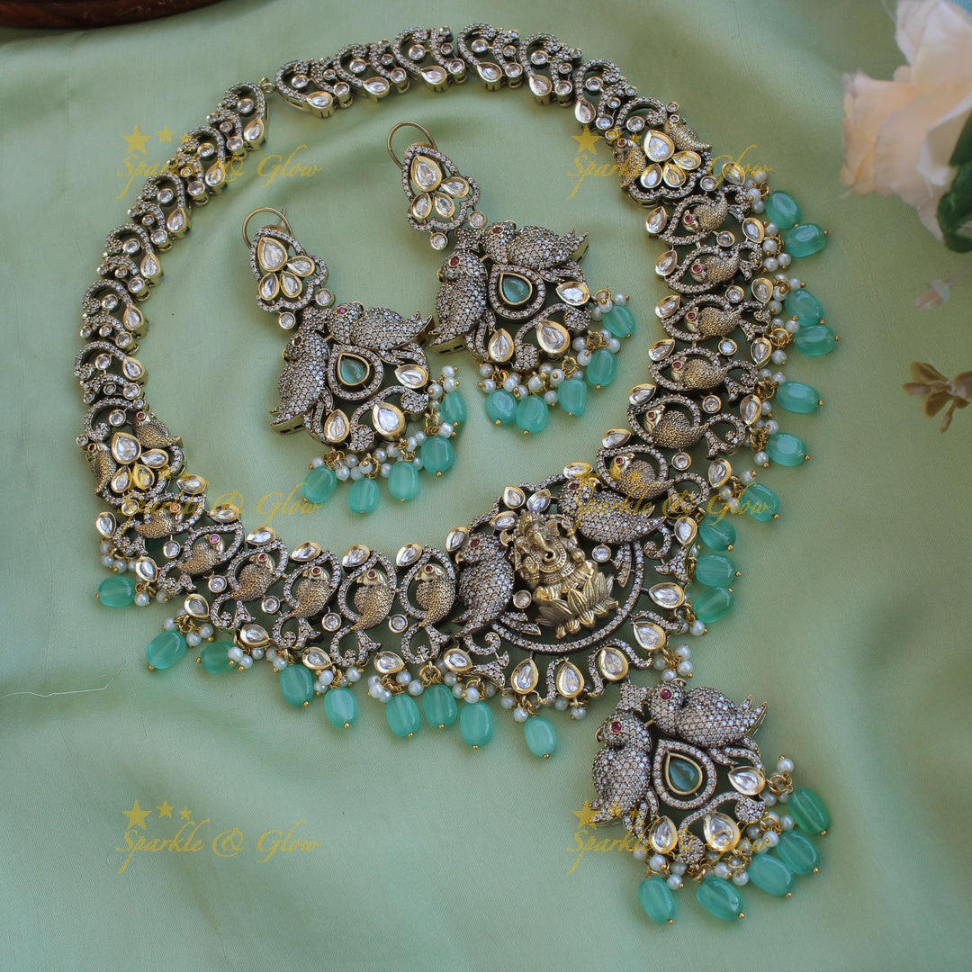 Grand intricate Ganesha parrot design Victorian AD long necklace with mint green beads