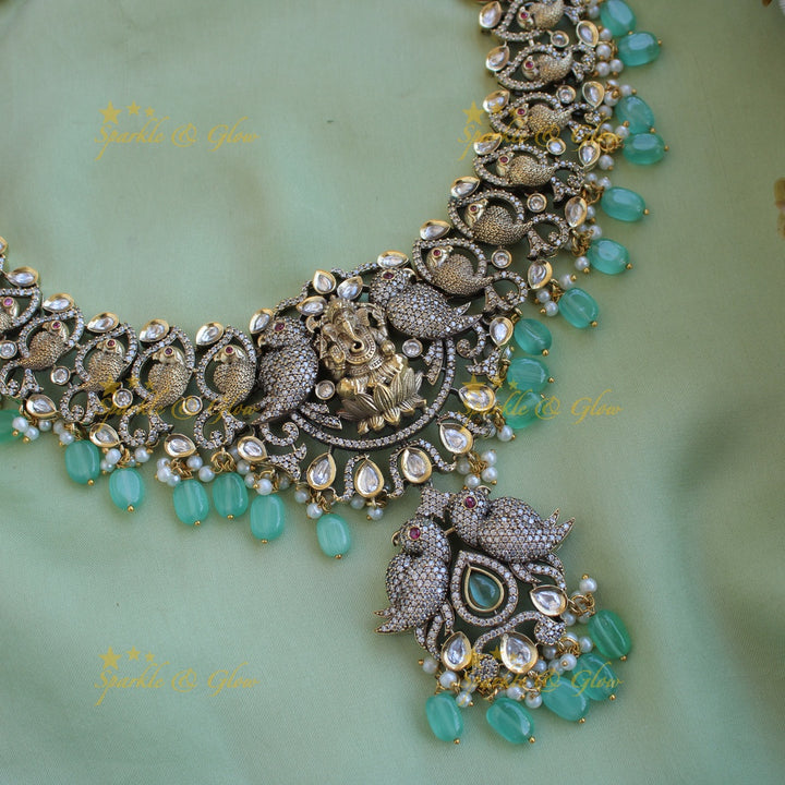 Grand intricate Ganesha parrot design Victorian AD long necklace with mint green beads