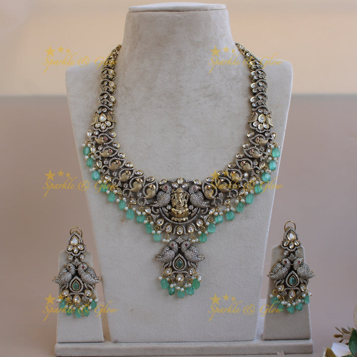 Grand intricate Ganesha parrot design Victorian AD long necklace with mint green beads