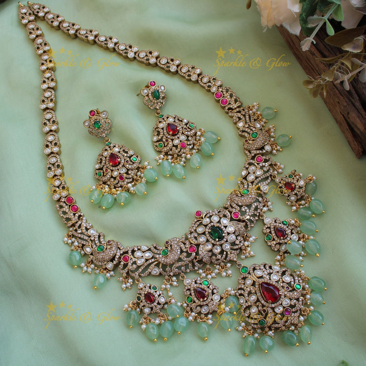 Stunning Peacock floral design Victorian AD long necklace with ruby emerald and mint green beads