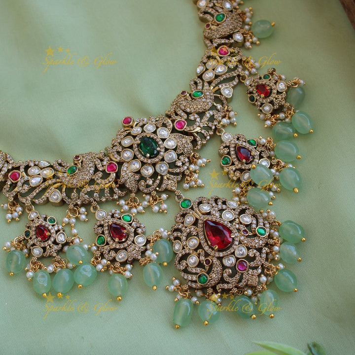 Stunning Peacock floral design Victorian AD long necklace with ruby emerald and mint green beads