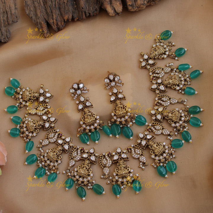 Elegant Lakshmi peacock floral design victorian AD short necklace with mint green beads