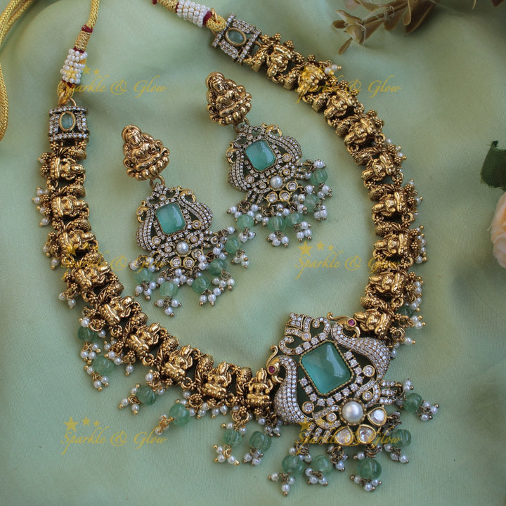 Beautiful Lakshmi Peacock design dual tone victorian AD short necklace with mint green beads and stones