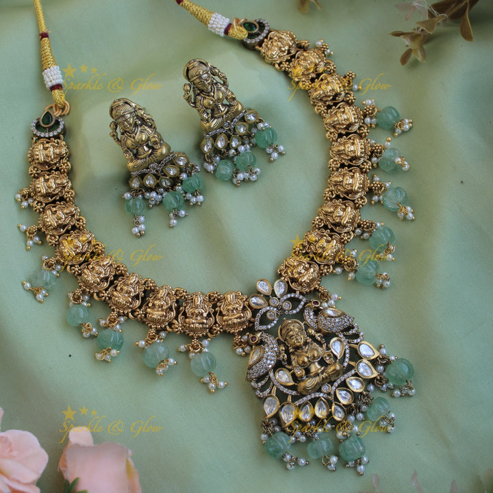 Stunning Lakshmi Peacock design dual tone victorian AD short necklace with mint green beads