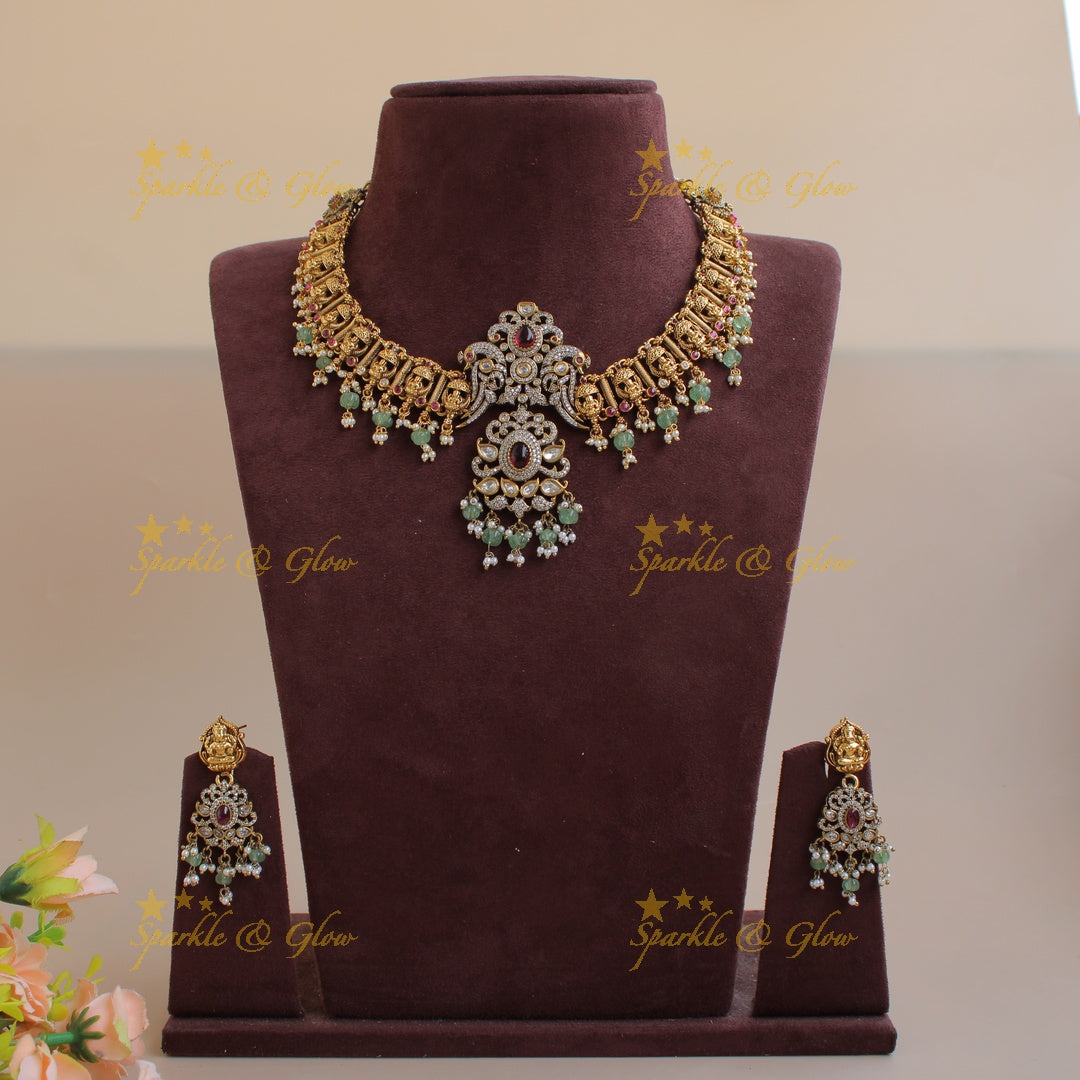 Gorgeous Lakshmi peacock half moon design dual tone victorian AD short necklace with ruby and mint green beads
