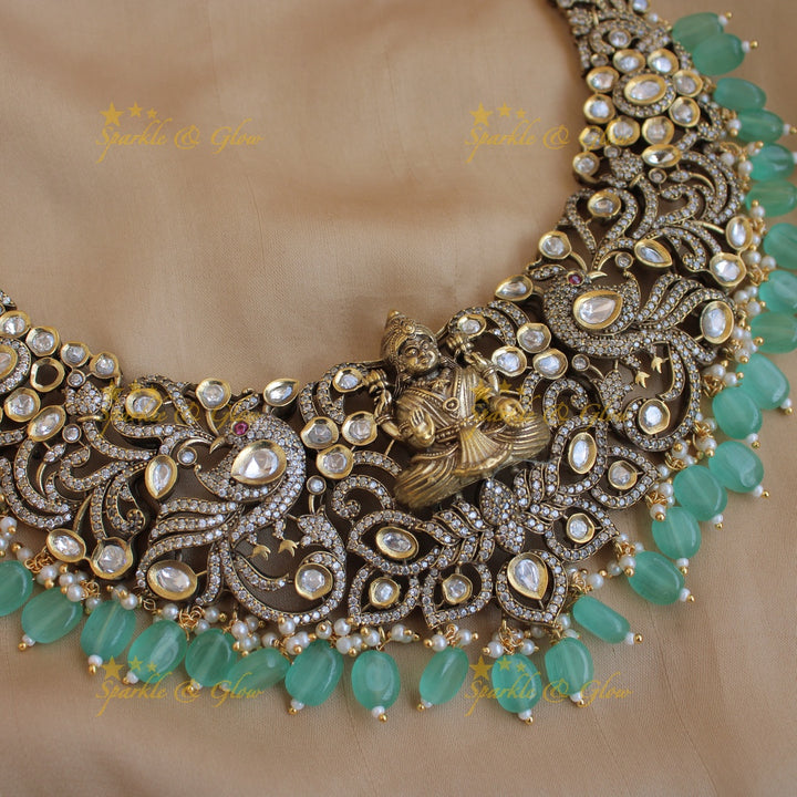 Gorgeous Lakshmi Peacock carved victorian AD short necklace with mint green beads