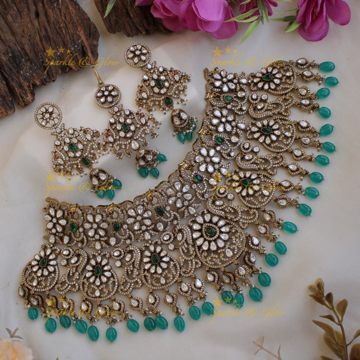 Gorgeous Bridal peacock floral design Victorian AD choker with emerald and green beads with maang tikka