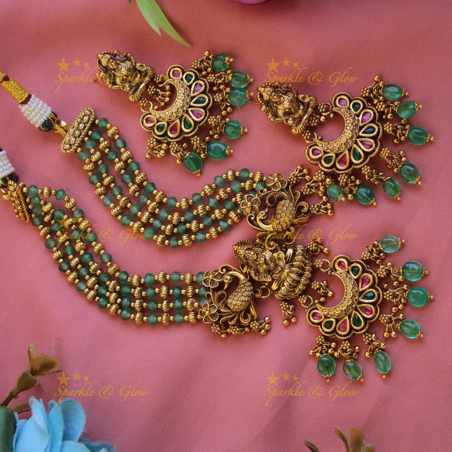 Elegant Lakshmi peacock carved jadau short necklace with gold beads and pearls - white1 - Sparkle and Glow