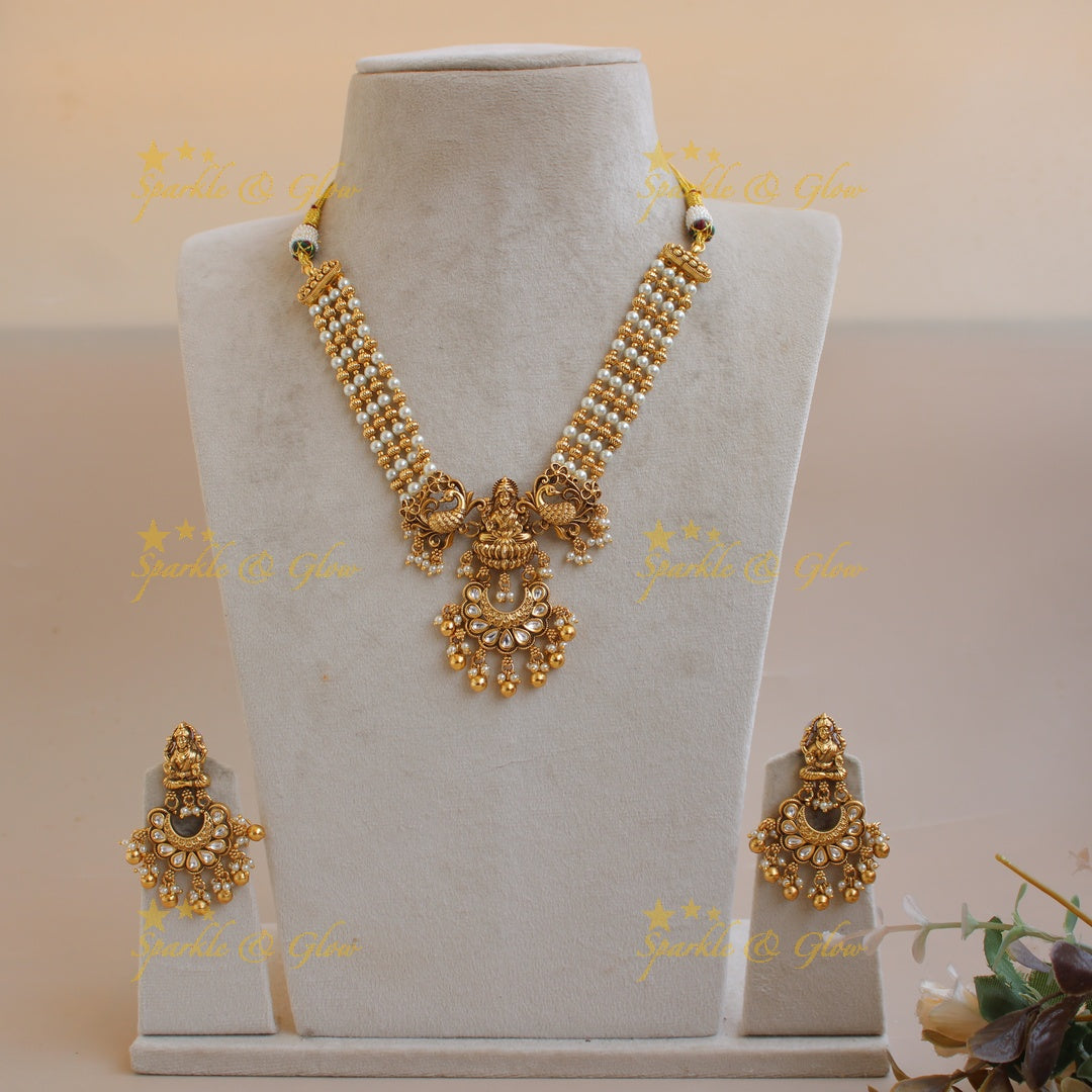 Elegant Lakshmi peacock carved jadau short necklace with gold beads and pearls - white1