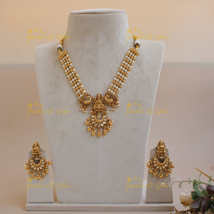 Elegant Lakshmi peacock carved jadau short necklace with gold beads and pearls - white1