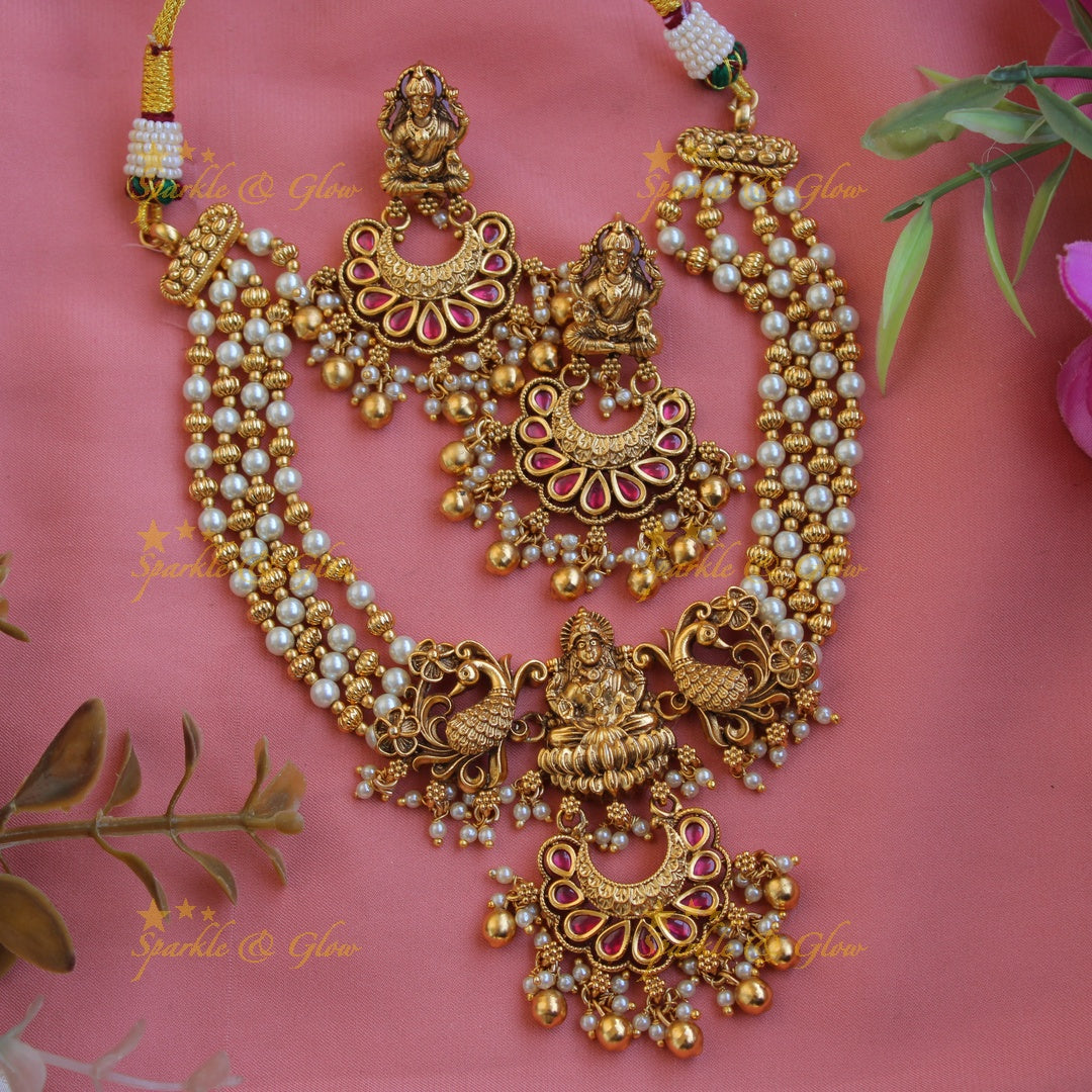 Elegant Lakshmi peacock carved jadau short necklace with gold beads and pearls - white1