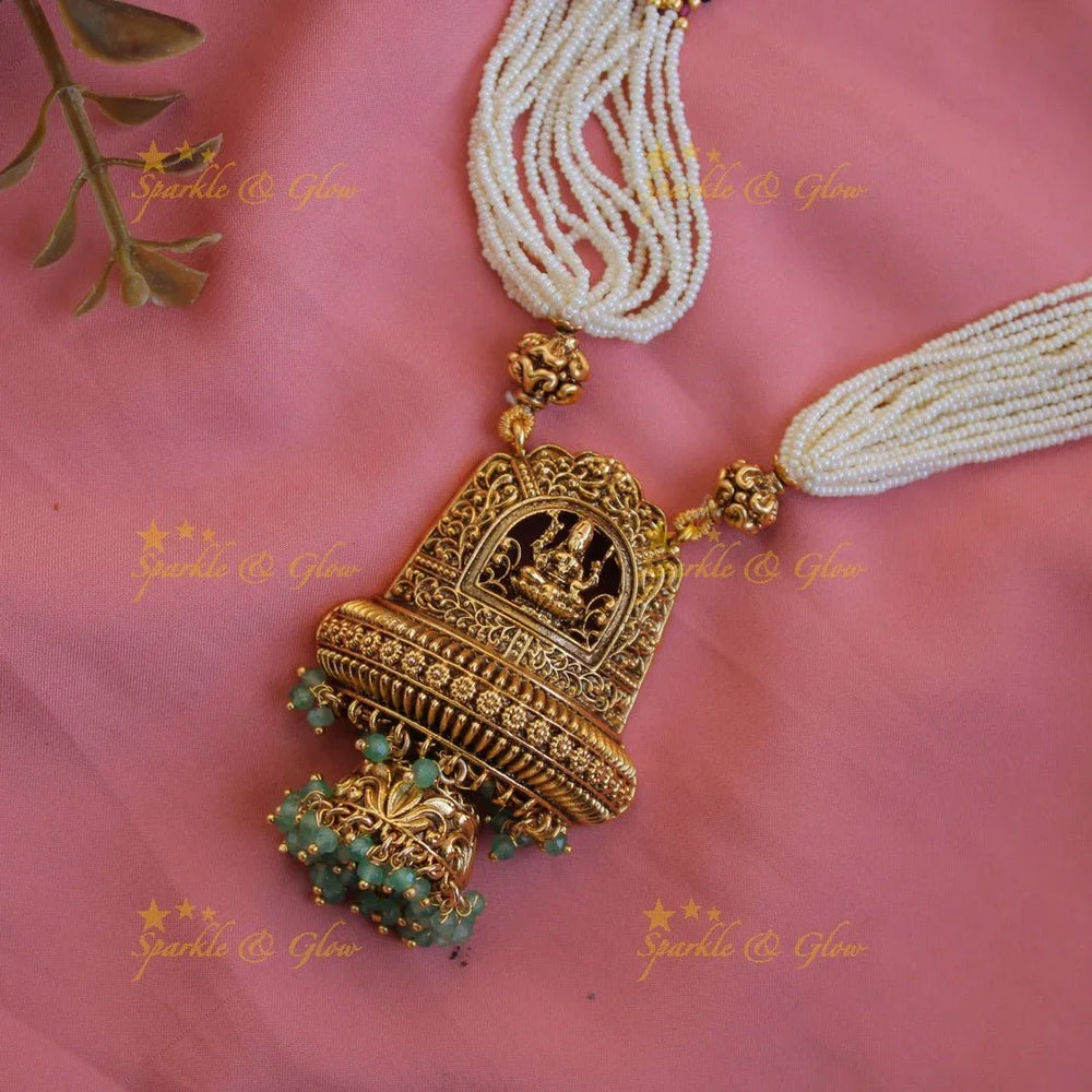Beautiful Lakshmi flower carved pendant haram with multi layer pearl chain and mint green beads - Sparkle and Glow