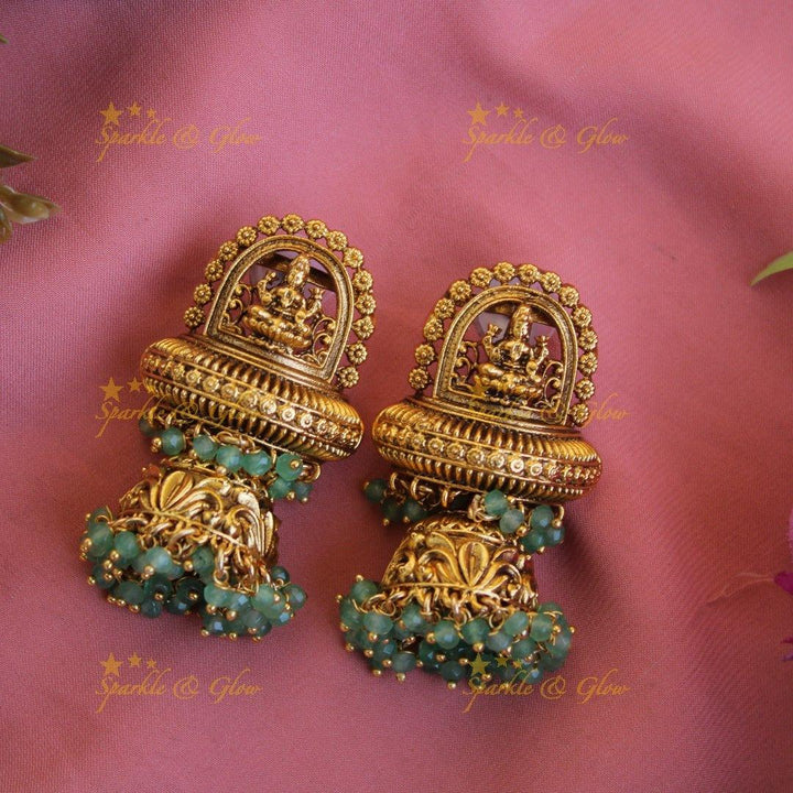 Beautiful Lakshmi flower carved pendant haram with multi layer pearl chain and mint green beads - Sparkle and Glow