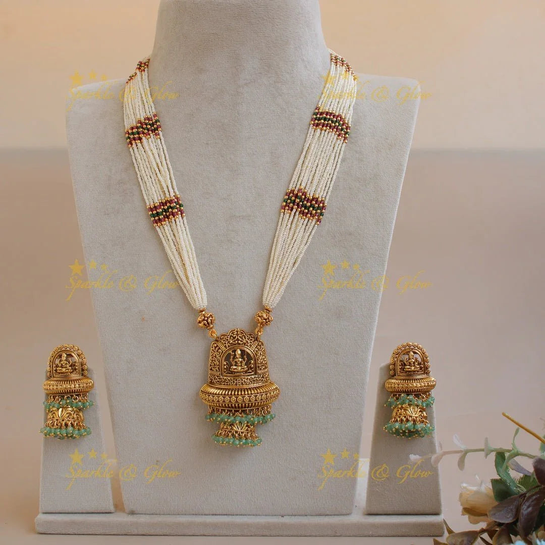 Beautiful Lakshmi flower carved pendant haram with multi layer pearl chain and mint green beads - Sparkle and Glow