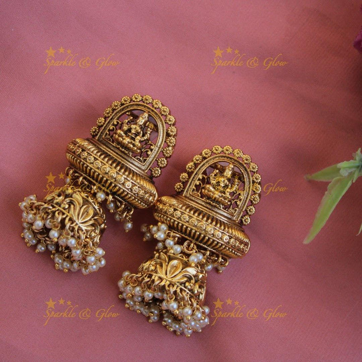 Beautiful Lakshmi flower carved pendant haram with multi layer pearl chain and pearl drops - Sparkle and Glow