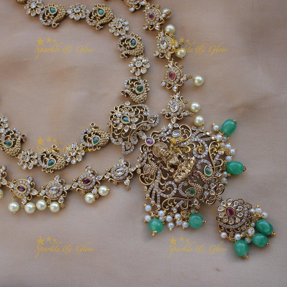 Stunning Lakshmi peacock floral design two layer long necklace with stones pearls and green beads - Sparkle and Glow