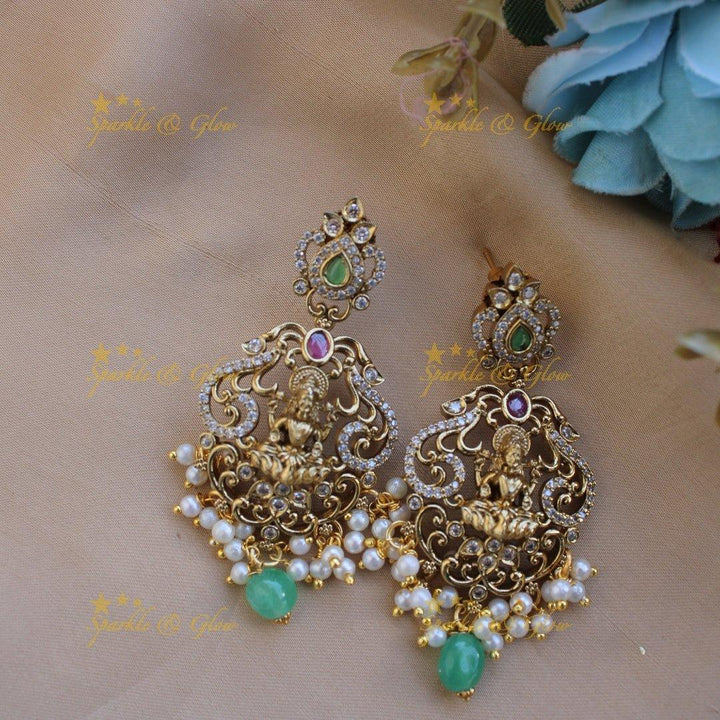 Stunning Lakshmi peacock floral design two layer long necklace with stones pearls and green beads - Sparkle and Glow