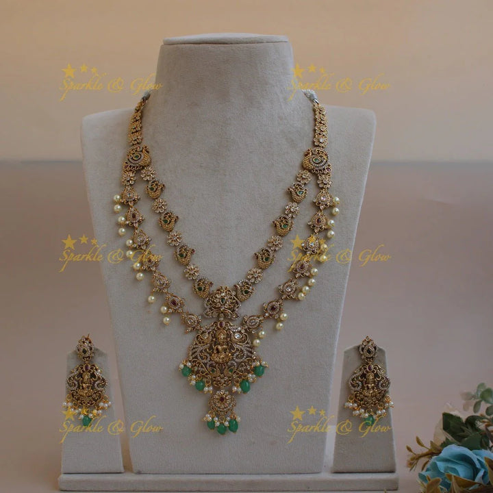 Stunning Lakshmi peacock floral design two layer long necklace with stones pearls and green beads - Sparkle and Glow