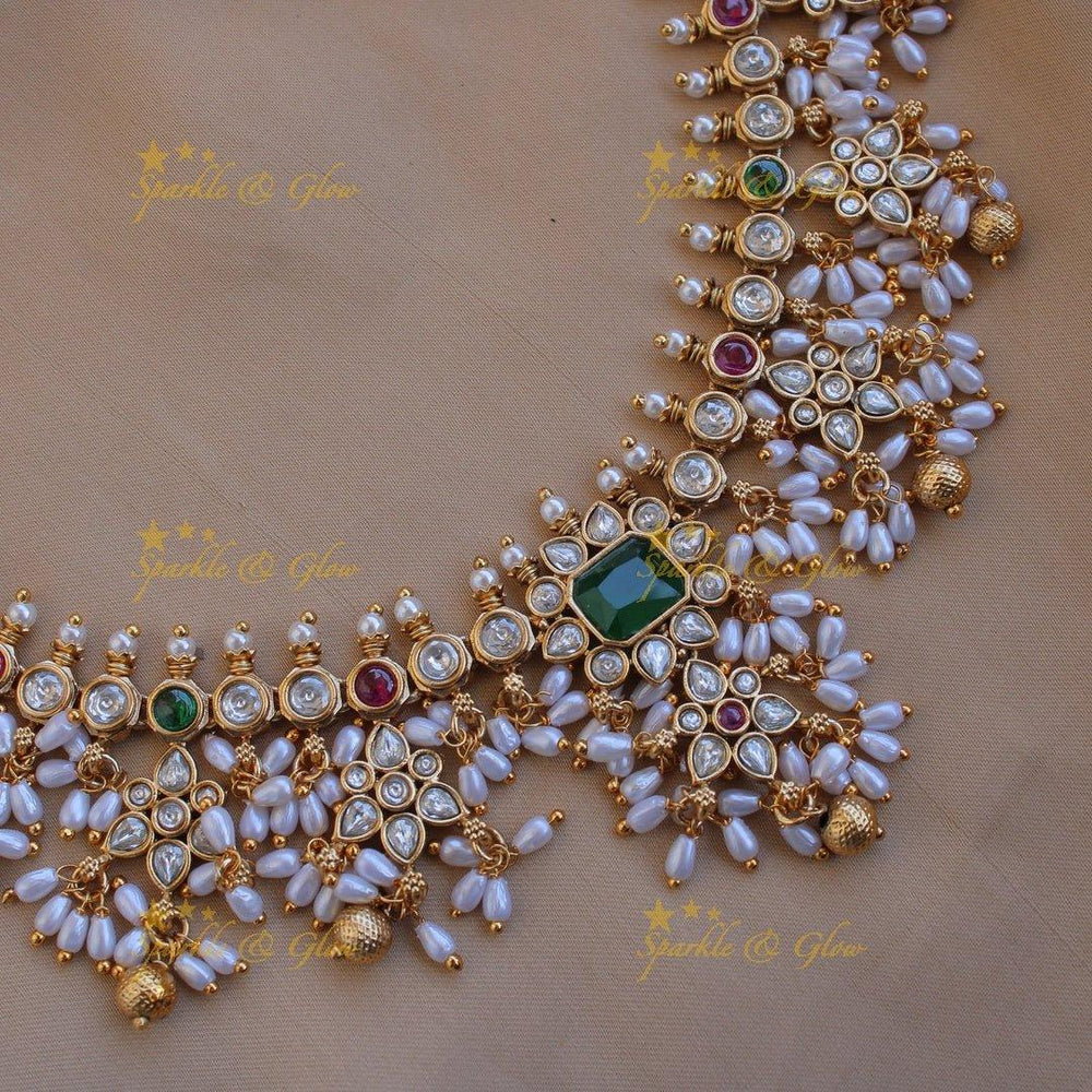 Exclusive floral design gutta pusalu long necklace with ruby emerald white stones and rice pealrs - Sparkle and Glow