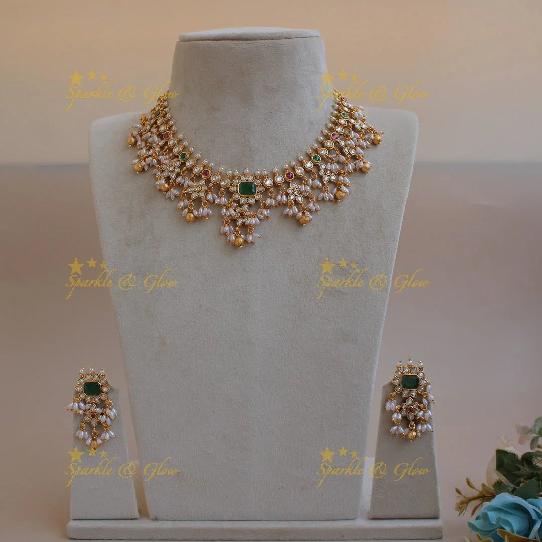 Statement floral design gutta pusalu short necklace with ruby emerald white stones and rice pealrs - Sparkle and Glow